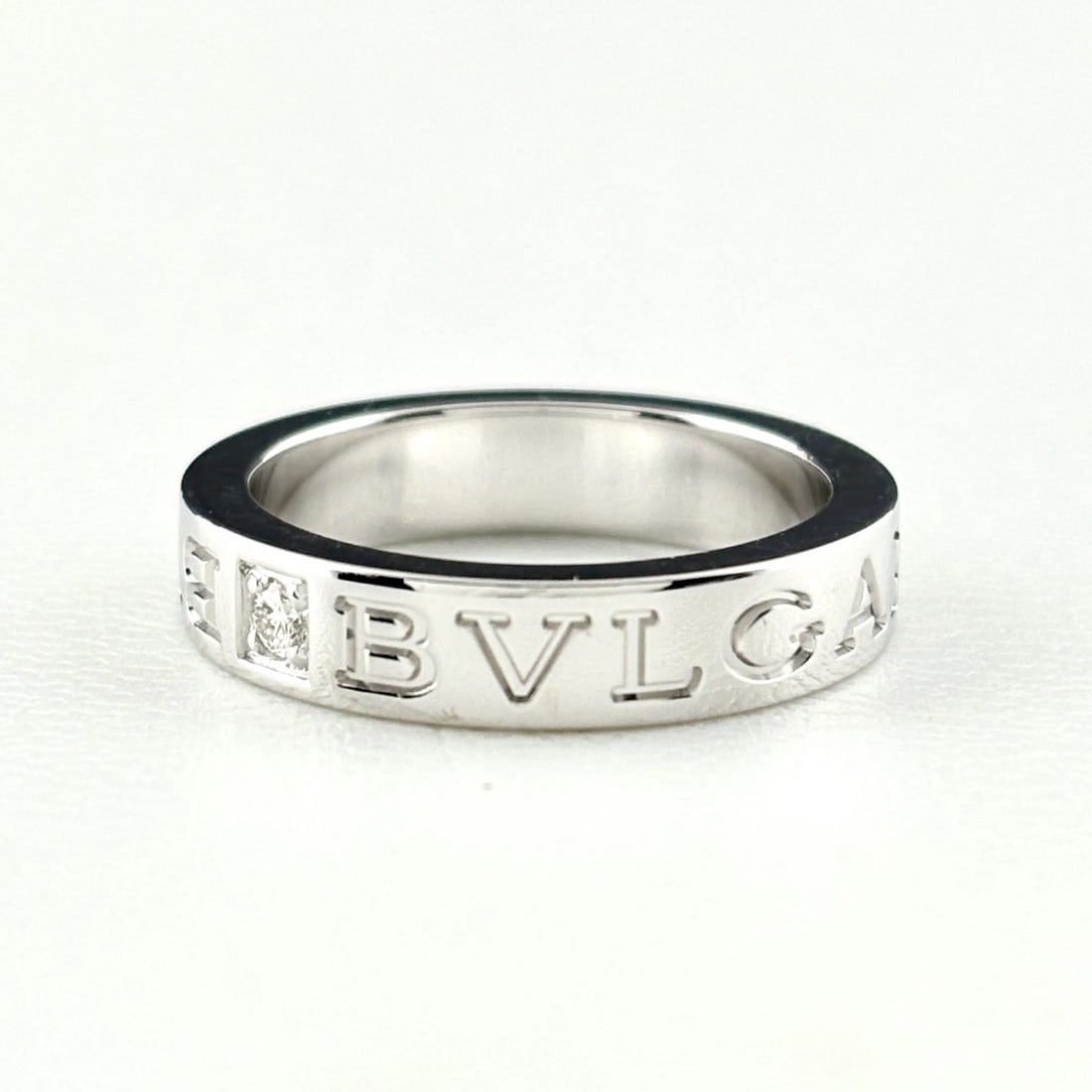 BVLGARI DOUBLE LOGO RING WG RING MELEE DIAMOND: Bvlgari Double Logo Ring Wg Ring Melee Diamond Brand: BVLGARI Type/Style: Ring Material: 750WG, Main Stone Natural Color: WG Size: US5 to 5.5 Accessories: None Accessories Notice: When purchasing