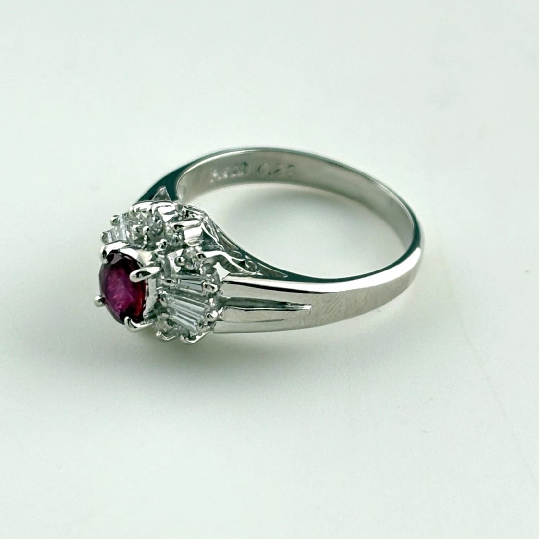 RUBY DESIGN RING PLATINUM MELEE DIAMOND RING: Ruby Design Ring Platinum Melee Diamond Ring Brand: Unbranded Type/Style: Ring Material: Pt900, Main Stone Ruby /Secondary Stone:Natural Color: None Size: US3.5 Accessories: None Accessories Notice: