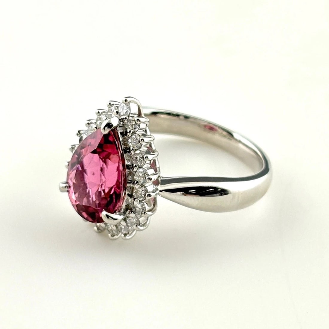 TOURMALINE DESIGN RING PLATINUM MELEE DIAMOND RING: Tourmaline Design Ring Platinum Melee Diamond Ring Brand: Unbranded Type/Style: Ring Material: Pt900, Main Stone Tourmaline /Secondary Stone:Natural Color: None Size: US7 to 7.5 Accessories: None