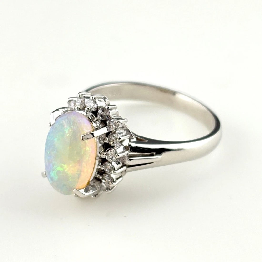 OPAL DESIGN RING PLATINUM RING MELEE DIAMOND RING PT900: Opal Design Ring Platinum Ring Melee Diamond Ring Pt900 Brand: Unbranded Type/Style: Ring Material: Pt900, Main Stone Opal /Secondary Stone:Natural Color: None Size: US7.5 to 8 Accessories: None