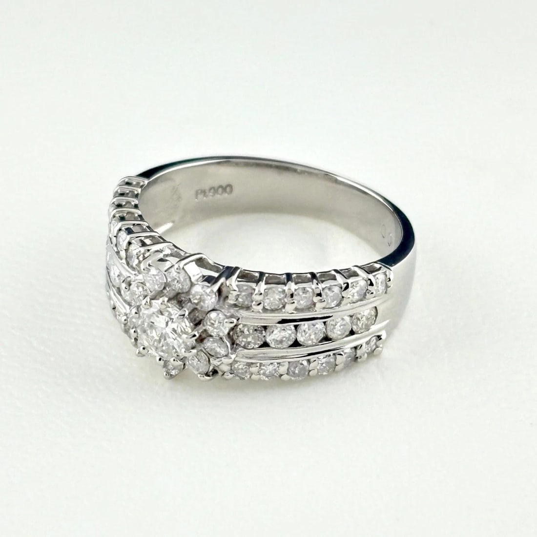 MELEE DIAMOND DESIGN RING PLATINUM RING: Melee Diamond Design Ring Platinum Ring Brand: Unbranded Type/Style: Ring Material: Pt900, Main Stone Natural Color: None Size: US5.5 to 6 Accessories: None Accessories Notice: When purcha