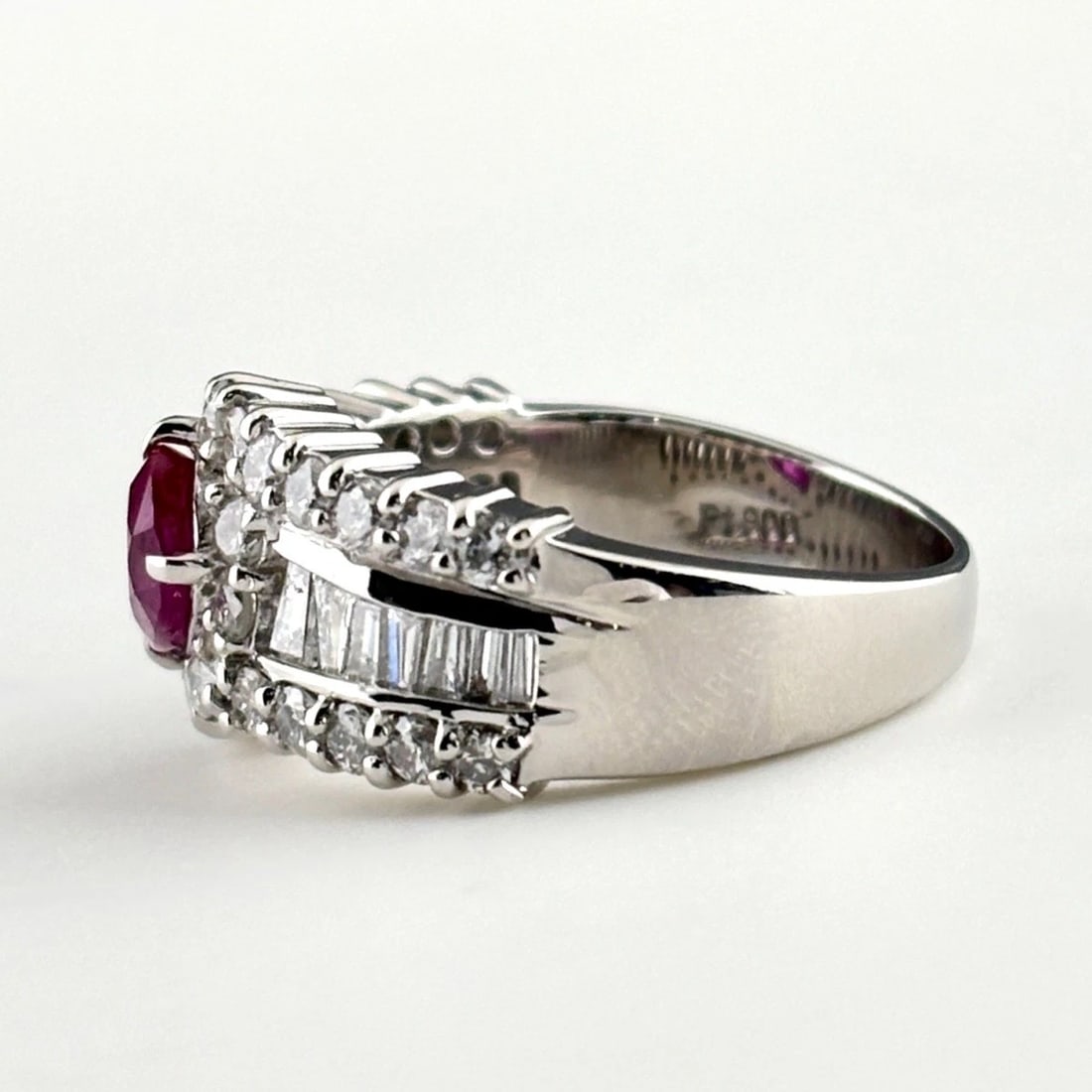 RUBY DESIGN RING PLATINUM MELEE DIAMOND RING: Ruby Design Ring Platinum Melee Diamond Ring Brand: Unbranded Type/Style: Ring Material: Pt900, Main Stone Ruby /Secondary Stone:Natural Color: None Size: US5.5 to 6 Accessories: None Accessories