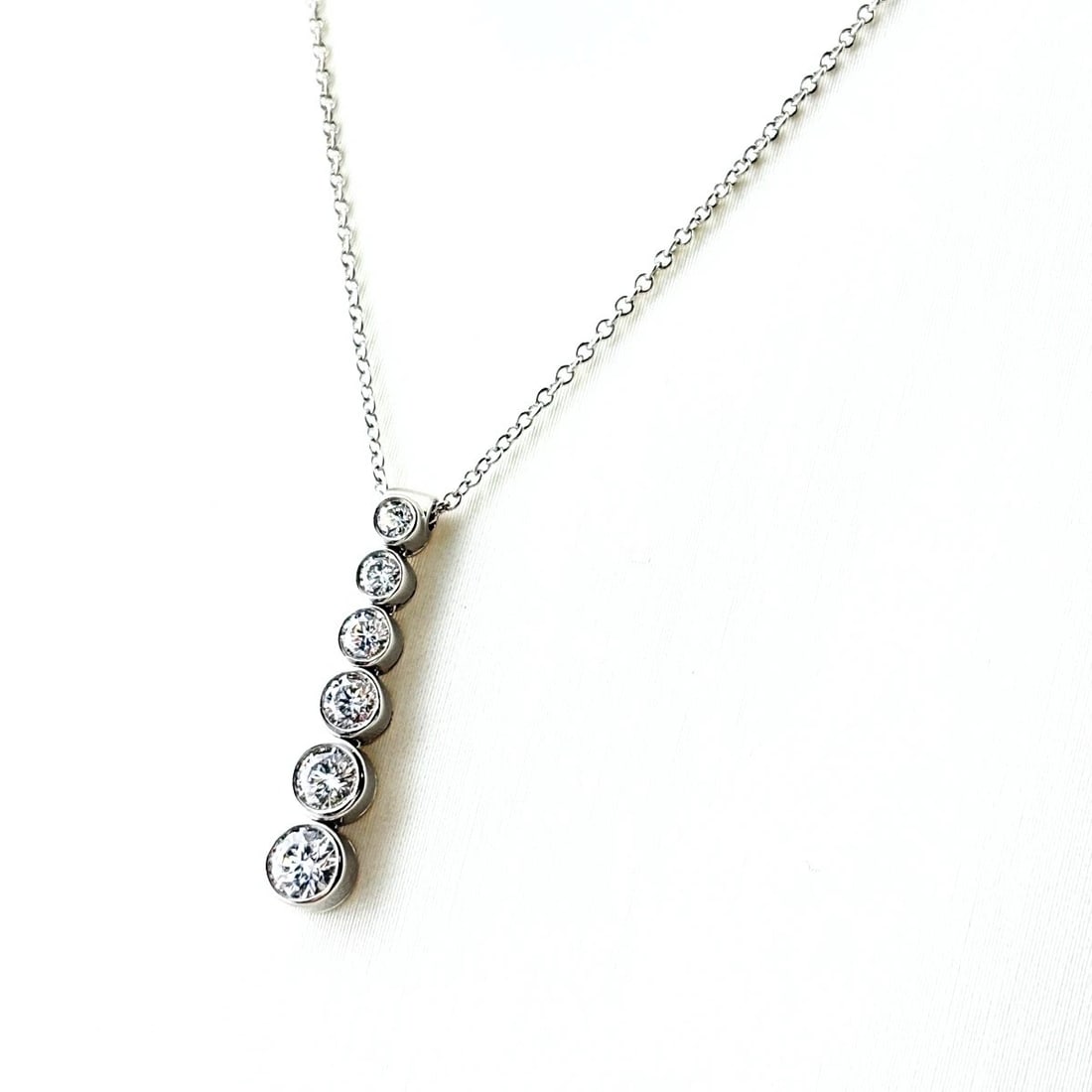 TIFFANY&CO. JAZZ GRADUATED MELEE DIAMOND PENDANT NECKLACE: Tiffany&Co. Jazz Graduated Melee Diamond Pendant Necklace Brand: TIFFANY&Co. Type/Style: Necklace Material: Pt950, Main Stone Natural Color: None Size: 22.8x4.2mm(0.9") Accessories: None Accessories
