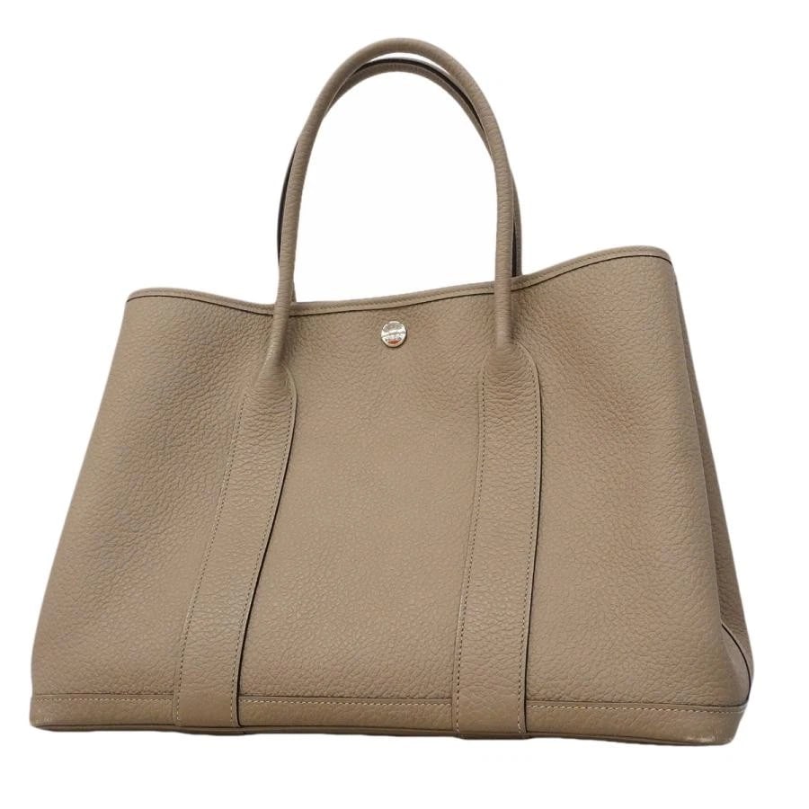 HERMES BAG: GARDEN PARTY PM C STAMP GRIS ASPHALT: HERMES Bag: Garden Party PM C stamp Gris Asphalt Brand: HERMES Type/Style: Tote Material: Exterior Material Leather Color: Exterior Color Gray Size: (approx. W14.6 ? H10.2 ? D7.3 inch) Accessories