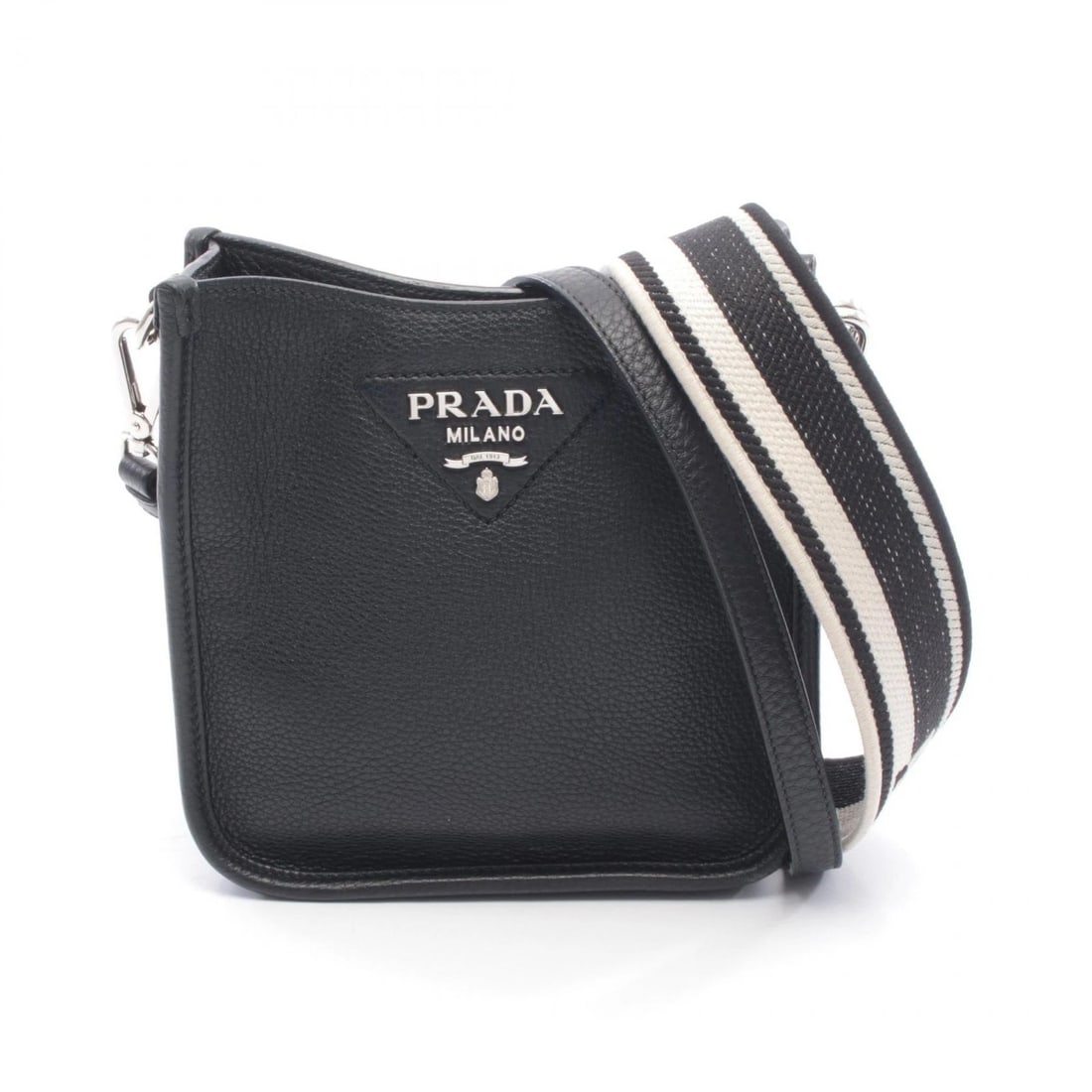 PRADA VIT.DAINO SOFT CROSSBODY SHOULDER BAG: PRADA VIT.DAINO SOFT Crossbody Shoulder Bag Brand: PRADA Type/Style: Shoulder Bag Material: leather ? canvas Color: Black?ish colors Size: (H:7.1inch x W:7.5inch x D:2.6inch) Accessories: None