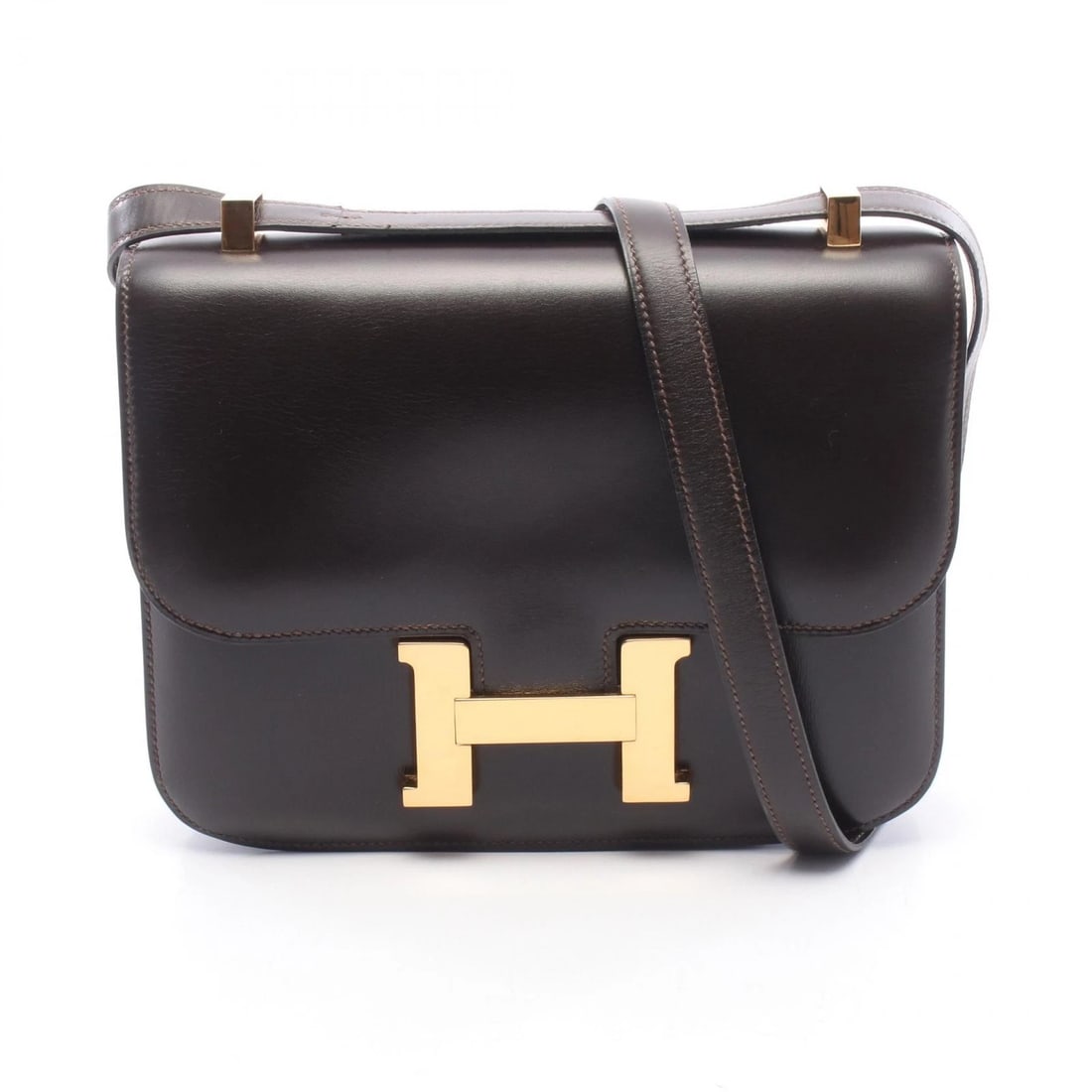 HERMES CONSTANCE 23 SHOULDER BAG BOX CALF LEATHER: HERMES Constance 23 Shoulder Bag Box calf leather Brand: HERMES Type/Style: Shoulder Bag Material: Box calf leather ? Calfskin (cowhide) Color: Evennes / Brown?ish colors Size: (H:6.9inch x W:9.1inch 