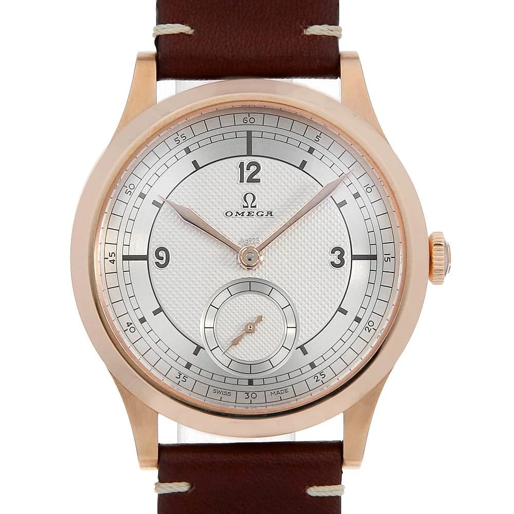OMEGA SPECIALITIES BRONZE GOLD WATCH: OMEGA Specialities Bronze Gold Watch Brand: OMEGA Type/Style: Wrist watch Material: Band Material Calfskin, Case Material Bronze Gold Color: Dial Color Silver Size: Case:W39mm Accessories: None