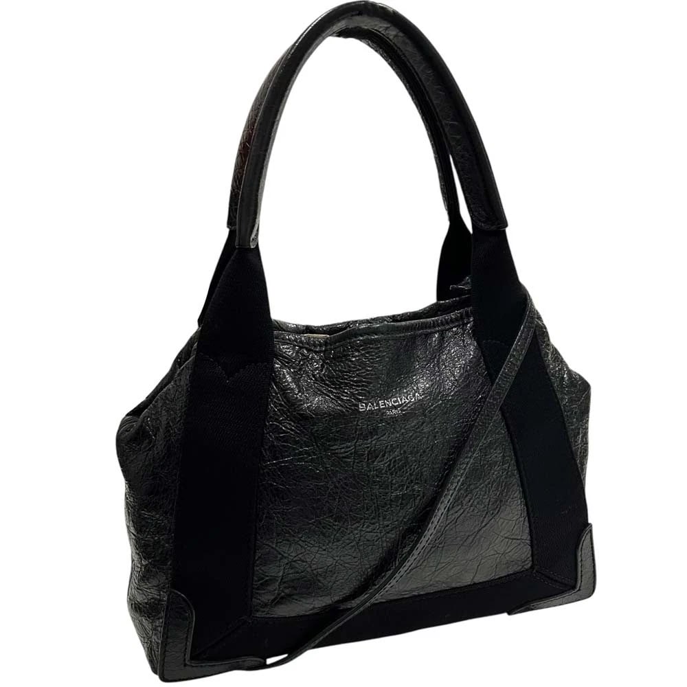 BALENCIAGA 2-WAY BAG: Balenciaga 2-Way Bag Brand: Balenciaga Type/Style: Top Handle Bag Material: Leather & Canvas Color: Black / Navy Size: Width x Height x Depth: approx. 9.84 x 7.09 x 1.97 inches (25 x 18 x 5 cm)