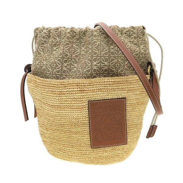 LOEWE SHOULDER BAG ANAGRAM POCHETTE BUCKET BAG RAFFIA: LOEWE Shoulder Bag Anagram Pochette Bucket Bag Raffia Brand: Loewe Type/Style: Shoulder Bag Material: Raffia Color: Beige Size: W: 16/29 cm ? H: 16 cm ? D: 10 cm ? Approx. W: 6.3inch/11.4inch ? H: 6.3