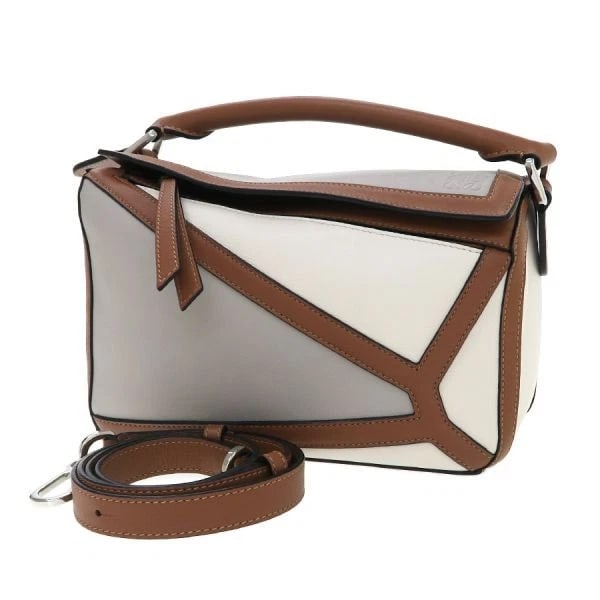 LOEWE SHOULDER BAG PUZZLE GRAPHIC BAG: Loewe Shoulder Bag Puzzle Graphic Bag Brand: Loewe Type/Style: Shoulder Bag Material: Leather Color: Multicolor Size: W: 24 cm ? H: 17 cm ? D: 10 cm ? Approx. W: 9.4inch ? H: 6.7inch ? D: 3.9inch