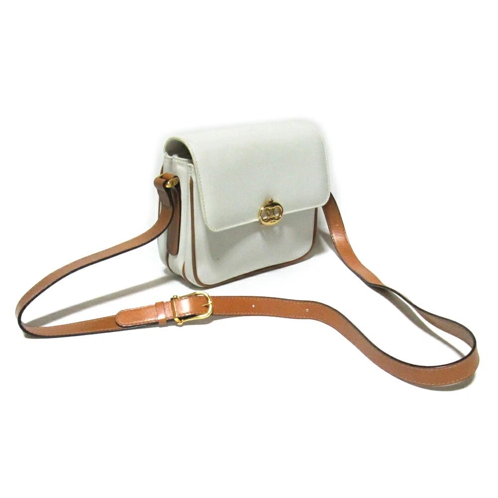 OLD CELINE WHITE GENUINE LEATHER CROSSBODY SHOULDER BAG: Old Celine White Genuine Leather Crossbody Shoulder Bag Brand: CELINE Type/Style: Shoulder Bag Material: Leather Color: White Size: Approx. H6.3inch ? W7.1inch ? D2.8inch Accessories: None