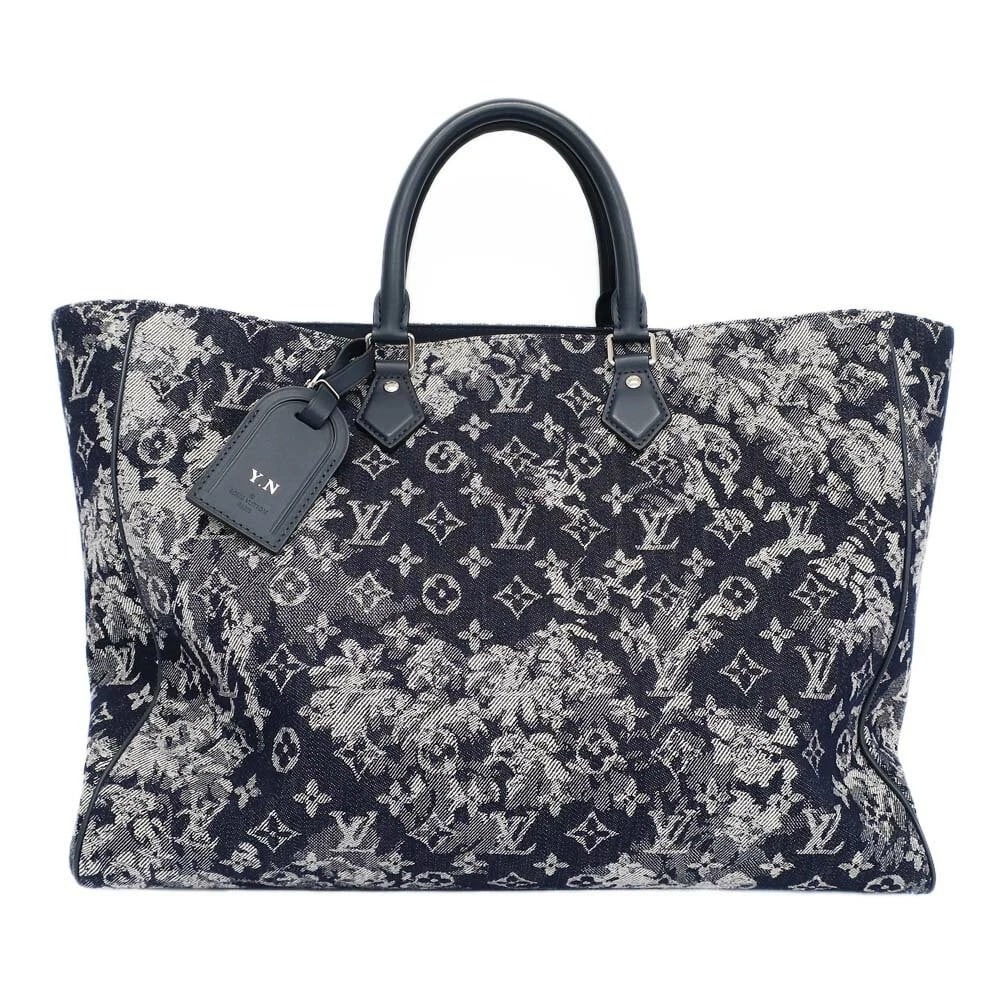 LOUIS VUITTON MONOGRAM TAPESTRY GRAND SAC NAVY BLUE: Louis Vuitton monogram tapestry Grand Sac Navy Blue Brand: Louis Vuitton Type/Style: Tote Material: Denim ? Leather Color: Navy ? Silver Hardware Size: W approx. 42.5cm ? H approx. 32cm ? D approx. 13