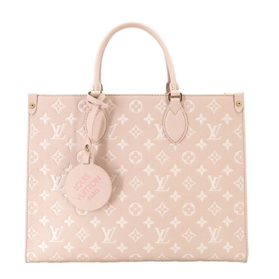 LOUIS VUITTON ONTHEGO MM MONOGRAM EMPREINTE ROSE BEIGE TOTE: Louis Vuitton Onthego MM Monogram Empreinte Rose Beige Tote Brand: Louis Vuitton Type/Style: Tote Material: Monogram Empreinte Leather Color: Rose Beige with Pink and Yellow accents Size: W 34.5cm x H