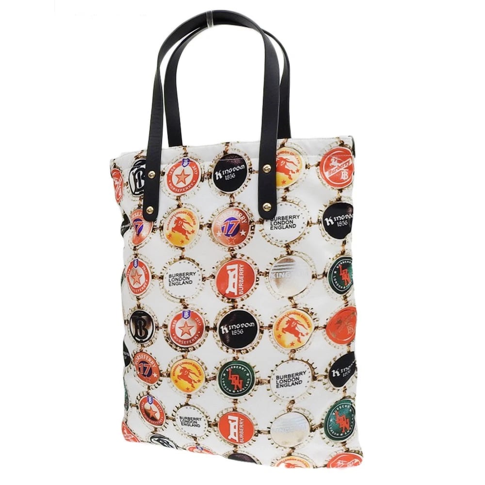 BURBERRY TOTE BAG BOTTLE CAP PRINT MULTICOLOR NYLON: Burberry Tote Bag Bottle Cap Print Multicolor Nylon Brand: Burberry Type/Style: Tote Material: Nylon Color: Multicolor Size: Width: approx. 13.8 inches (35 cm) Height: approx. 16.5 inches (42 cm)