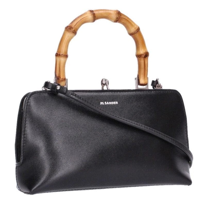 JILSANDER GOJI BAMBOO LEATHER 2WAY BLACK BAG: JILSANDER Goji Bamboo Leather 2way Black bag Brand: JILSANDER Type/Style: Satchel/Top Handle Bag Material: Exterior Material Leather Color: Exterior Color Black Size: (approx. W7.7 ? H4.5 ? D2.0