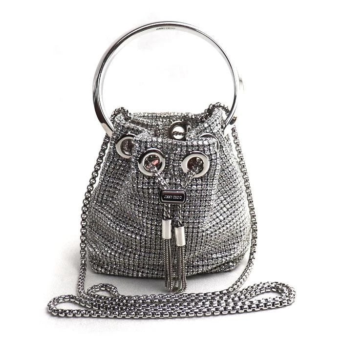 JIMMY CHOO MICRO BON BON MINI BUCKET SILVER BAG: JIMMY CHOO Micro Bon Bon Mini Bucket Silver bag Brand: JIMMY CHOO Type/Style: Bucket & Drawstring Bag Material: Exterior Material Crystal Color: Exterior Color Silver Size: (approx. W4.5 ? H4.7 ?