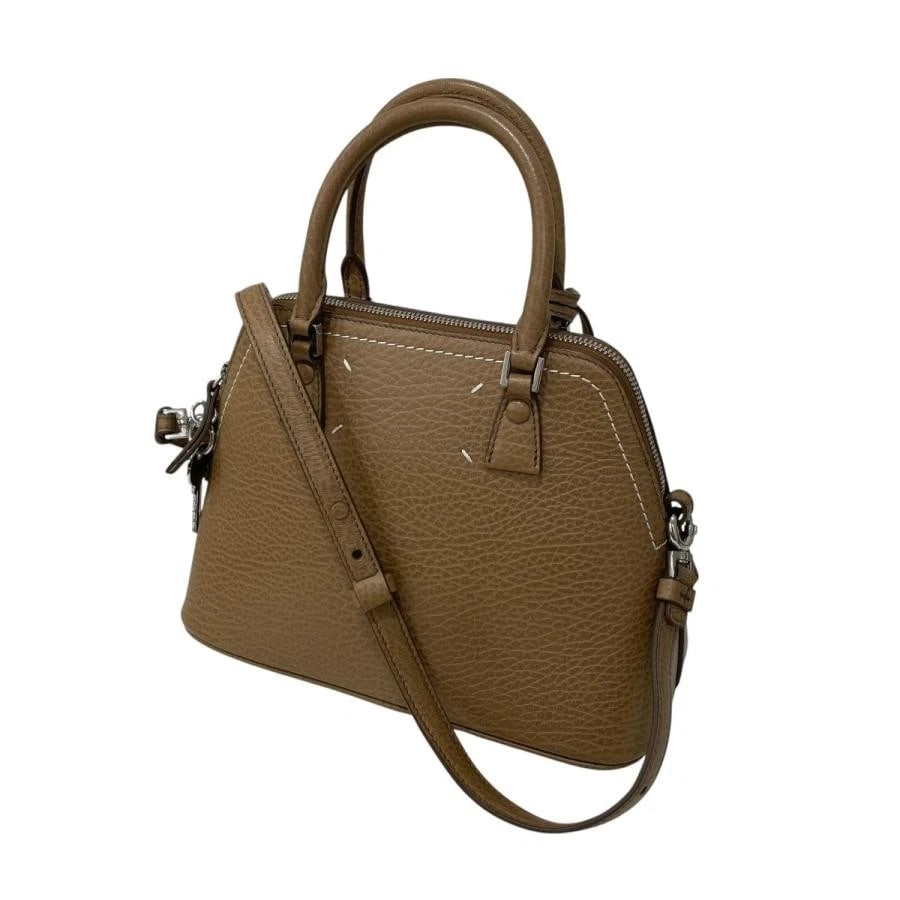 MAISON MARGIELA BAG: 2WAY BROWN: MAISON MARGIELA Bag: 2WAY Brown Brand: Maison Margiela Type/Style: Crossbody Material: Exterior Material Leather Color: Exterior Color Brown Size: (approx. W9.8 ? H7.5 ? D4.7 inch) Accessories: No