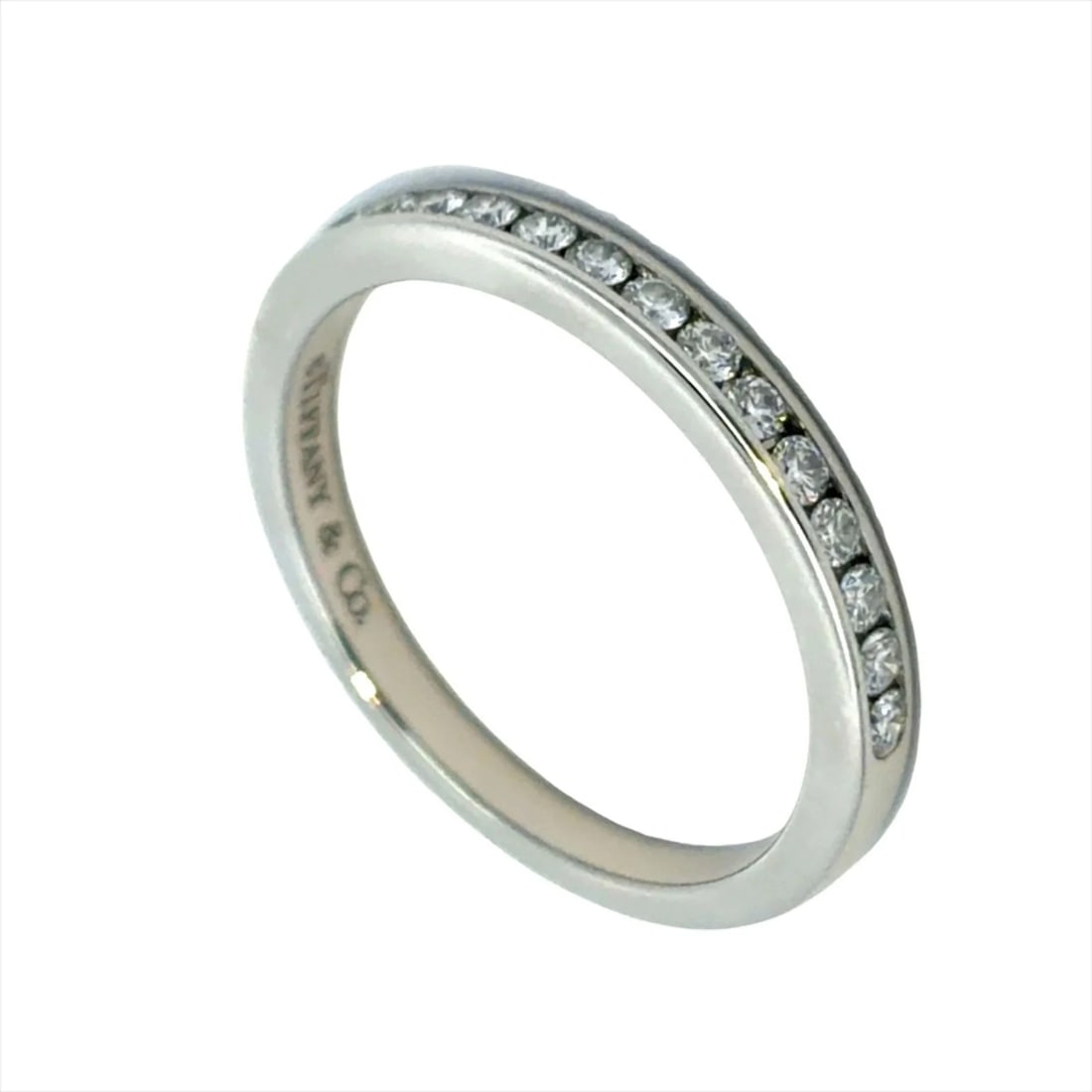TIFFANY & CO. SOLESTE HALF ETERNITY RING, DIAMOND PLATINUM: Tiffany & Co. Soleste Half Eternity Ring, Diamond Platinum Brand: Tiffany Type/Style: Band ring Material: Platinum 950, Main Stone Natural Color: Platinum Size: US 3.5 Accessories: None Ac