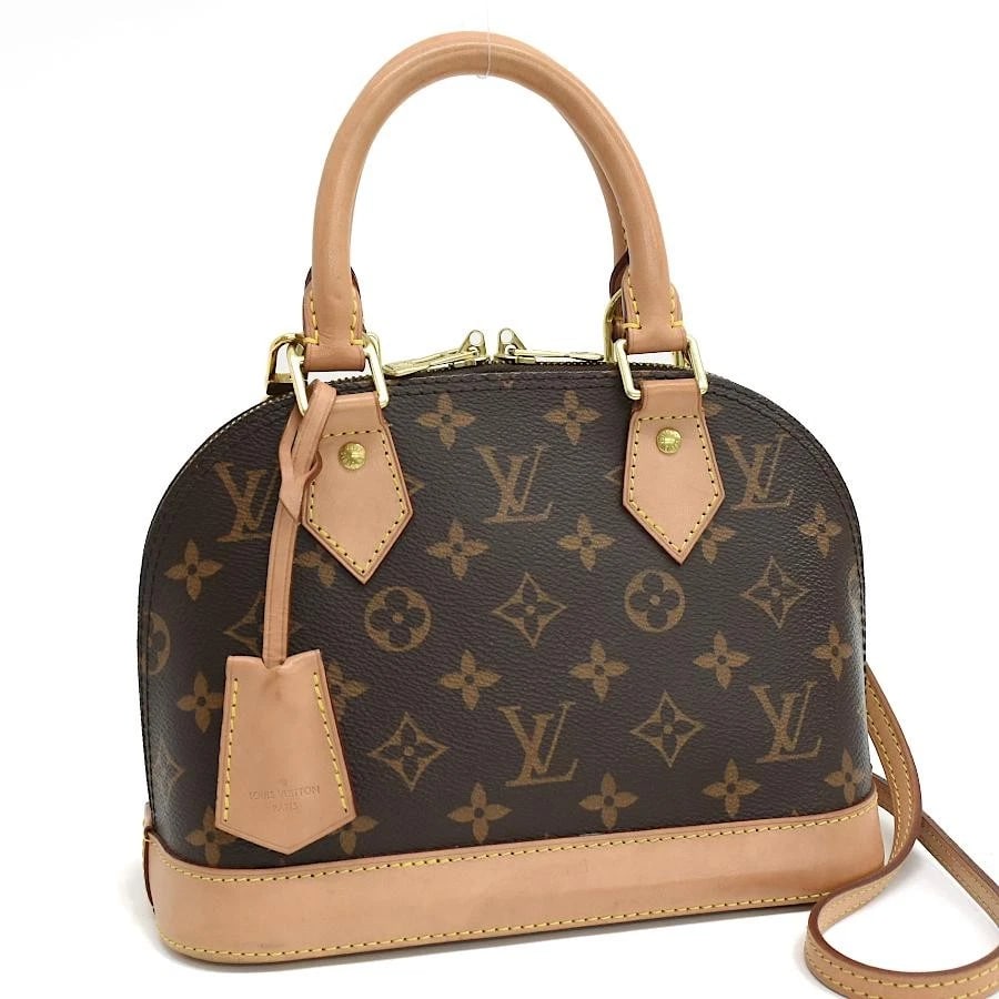 LOUIS VUITTON BAG: ALMA BB M46990 BROWN: LOUIS VUITTON Bag: Alma BB M46990 Brown Brand: LOUIS VUITTON Type/Style: Top Handle Bag Material: Exterior Material Canvas Color: Exterior Color Brown Size: (approx. W9.3 ? H6.9 ? D4.5 inch) Acces