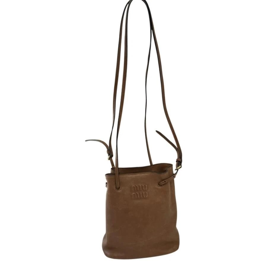 MIU MIU BAG: NAPPA LEATHER BROWN: MIU MIU Bag: Nappa Leather Brown Brand: MIU MIU Type/Style: Shoulder Bag Material: Exterior Material Leather Color: Exterior Color Brown Size: (approx. W5.5 ? H6.3 ? D2.4 inch) Accessories: None <