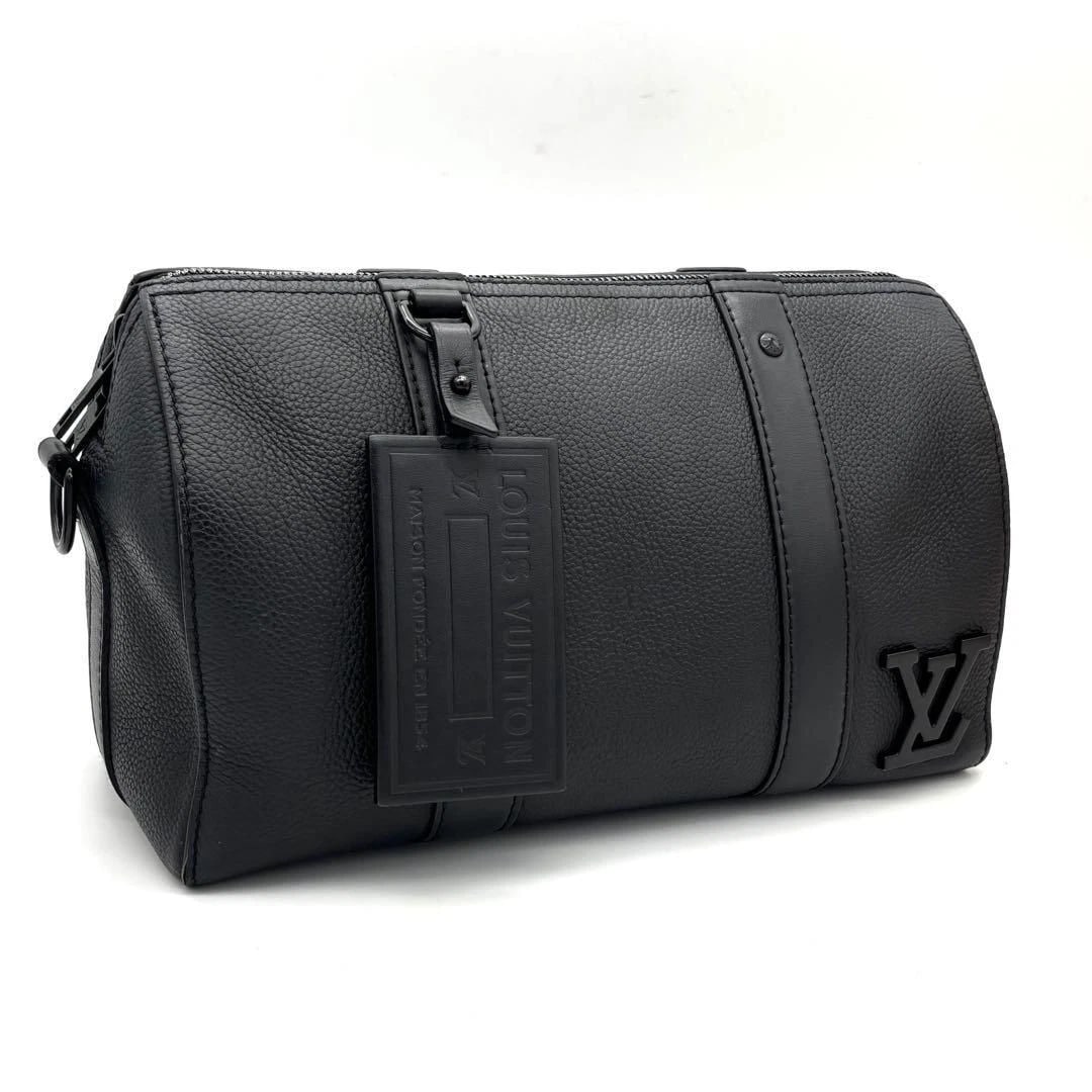 LOUIS VUITTON BAG: CITY KEEPALL BLACK: LOUIS VUITTON Bag: City Keepall Black Brand: LOUIS VUITTON Type/Style: Shoulder Bag Material: Exterior Material Leather Color: Exterior Color Black Size: (approx. W10.6 ? H6.7 ? D5.1 inch)