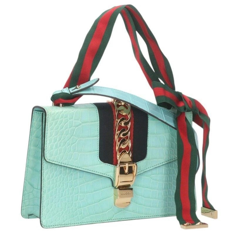 GUCCI BAG: SYLVIE LIGHT BLUE: GUCCI Bag: Sylvie Light Blue Brand: GUCCI Type/Style: Shoulder Bag Material: Exterior Material Leather Color: Exterior Color Light Blue Size: (approx. W9.8 ? H6.9 ? D2.6 inch) Accessories: None