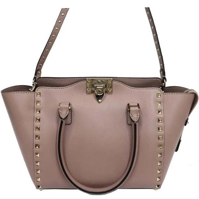 VALENTINO BAG: ROCKSTUD TOTE SHOULDER: VALENTINO Bag: Rockstud Tote Shoulder Brand: VALENTINO Type/Style: Tote Material: Exterior Material Leather Color: Exterior Color Beige Size: (approx. W15.0/9.1 ? H8.7 ? D4.7 inch) Accessories: None