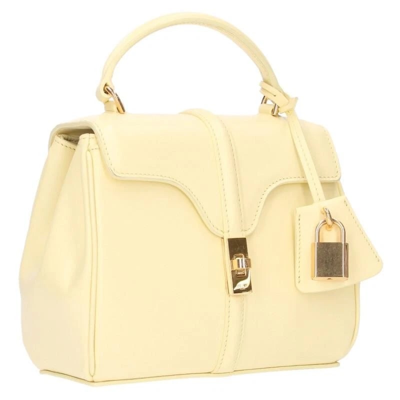 CELINE BAG: SEIZE YELLOW: CELINE Bag: Seize Yellow Brand: CELINE Type/Style: Satchel/Top Handle Bag Material: Exterior Material Leather Color: Exterior Color Yellow Size: (approx. W8.1 ? H5.9 ? D2.6 inch) Accessories: None