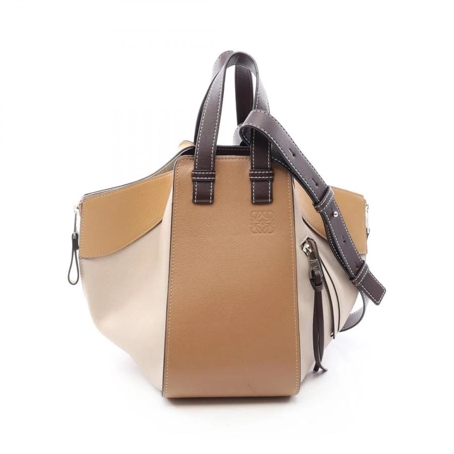 LOEWE BAG: HAMMOCK SMALL BEIGE/BROWN: LOEWE Bag: Hammock Small Beige/Brown Brand: LOEWE Type/Style: Satchel/Top Handle Bag Material: Exterior Material Leather Color: Exterior Color Beige / Brown Size: (approx. W5.5 ? H9.8 ? D9.8 inch)