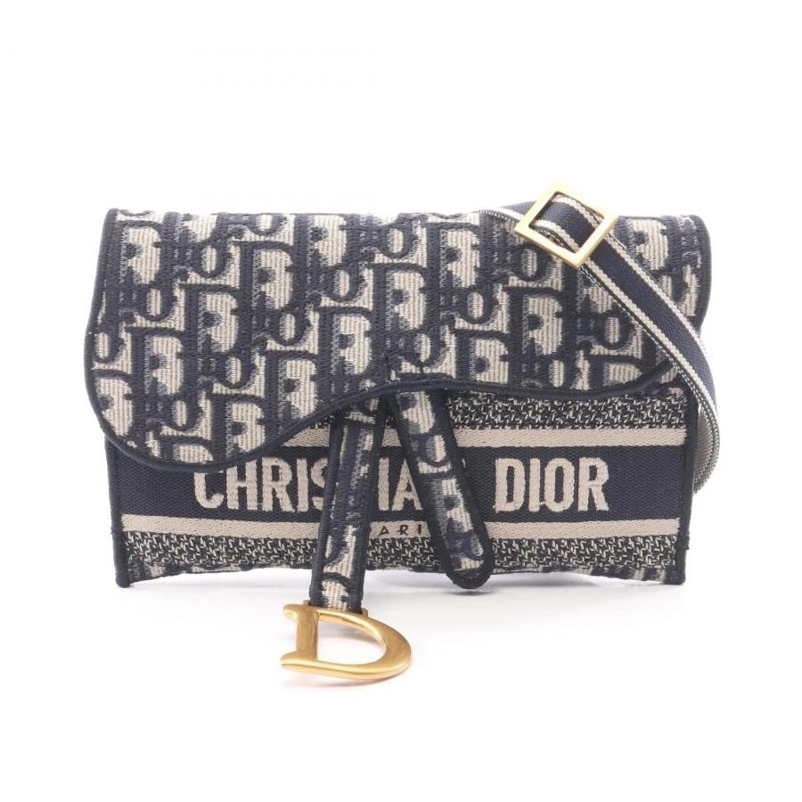 DIOR BAG: SADDLE SLIM POUCH: DIOR Bag: Saddle Slim Pouch Brand: Dior Type/Style: Shoulder Bag Material: Exterior Material Canvas Color: Exterior Color Navy / Beige Size: (approx. W7.9 ? H5.1 ? D0.8 inch) Accessories: None
