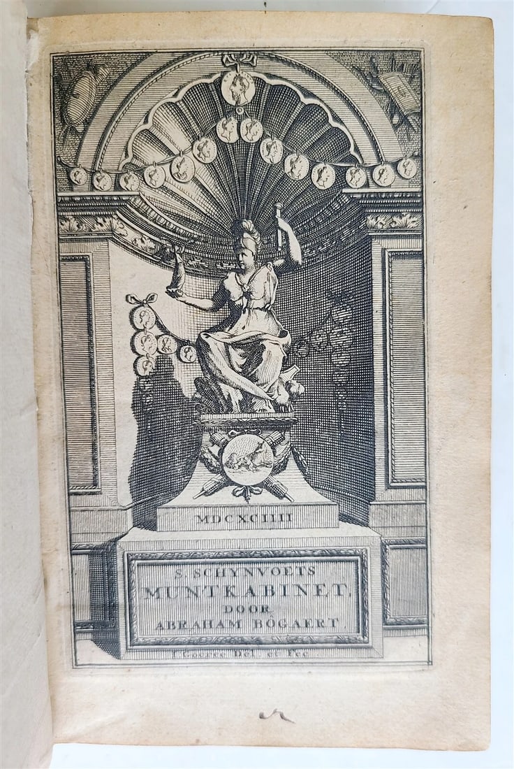 AN ILLUSTRATION OF ANTIQUE VELLUM BINDING FROM THE NETHERLANDS, 1695: Year/Century: 17th century Language: Dutch Subject: Illustrated Binding: Vellum Description: Schynvoets Muntkabinet der Roomsche Keizers en Keizerinnen [Numismatics] Bogaert, A. S. Amsterdam: Erfg. J.