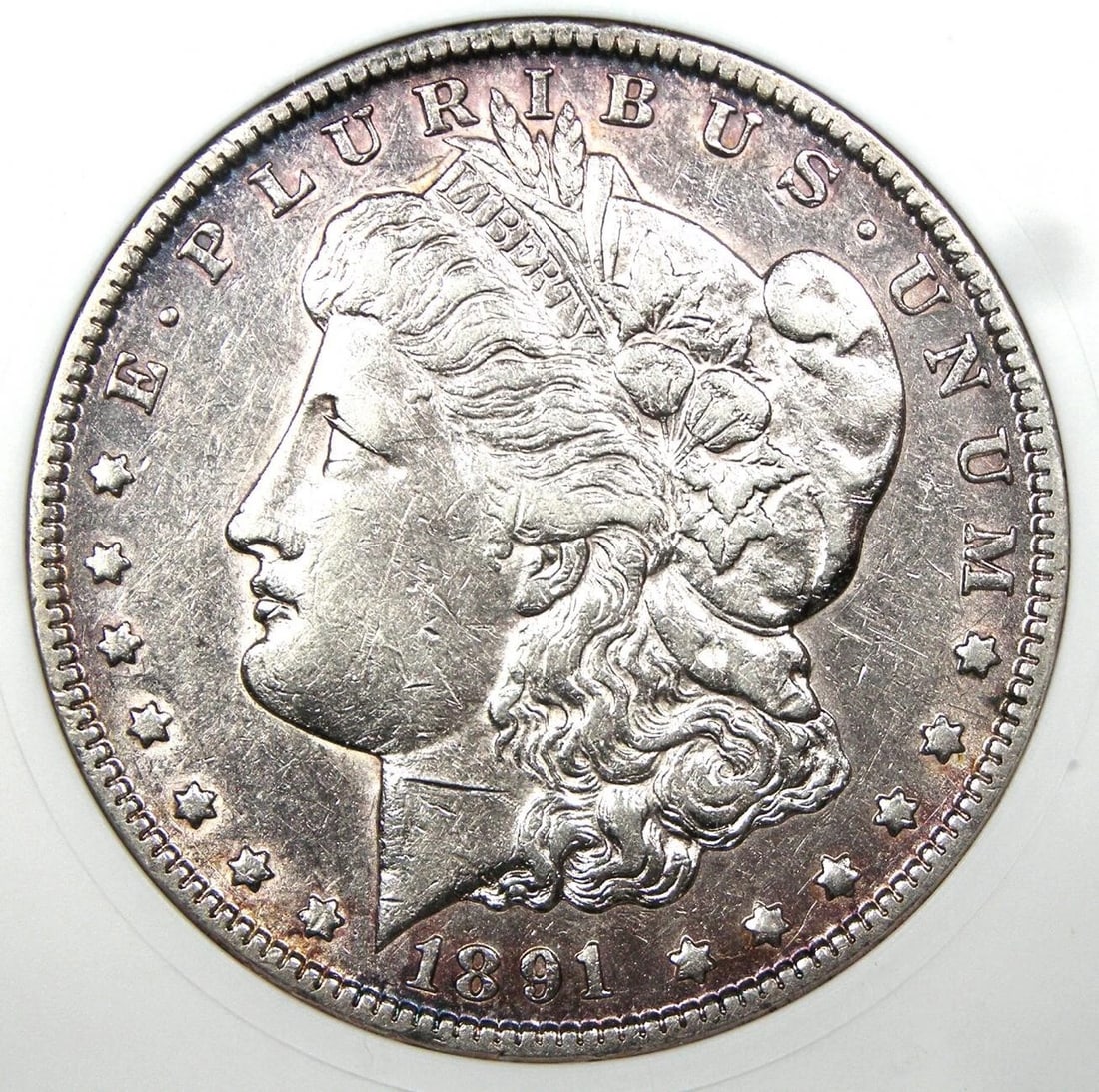 1891-CC MORGAN DOLLAR $1 CARSON CITY COIN: 1891-CC Morgan Dollar $1 Carson City Coin Year: 1891 Denomination: $1 Country of Origin: United States Accessories: None Accessories Notice: When purchasing pre-owned goods, please refer to the
