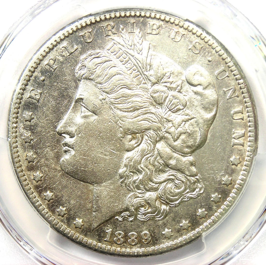 1889-CC MORGAN SILVER DOLLAR $1 CARSON CITY COIN: 1889-CC Morgan Silver Dollar $1 Carson City Coin Year : 1889 Denomination : $1 Country of Origin : United States Accessories: None Accessories Notice: When purchasing pre-owned goods, please refer to 