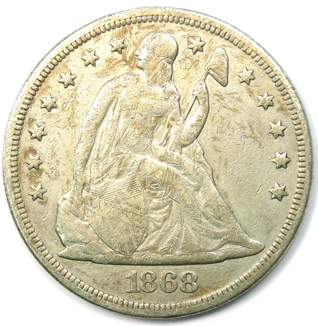 1868 SEATED LIBERTY SILVER DOLLAR $1 COIN: 1868 Seated Liberty Silver Dollar $1 Coin Year: 1868 Denomination: $1 Country of Origin: United States Accessories: None Accessories Notice: When purchasing pre-owned goods, please refer to the photos