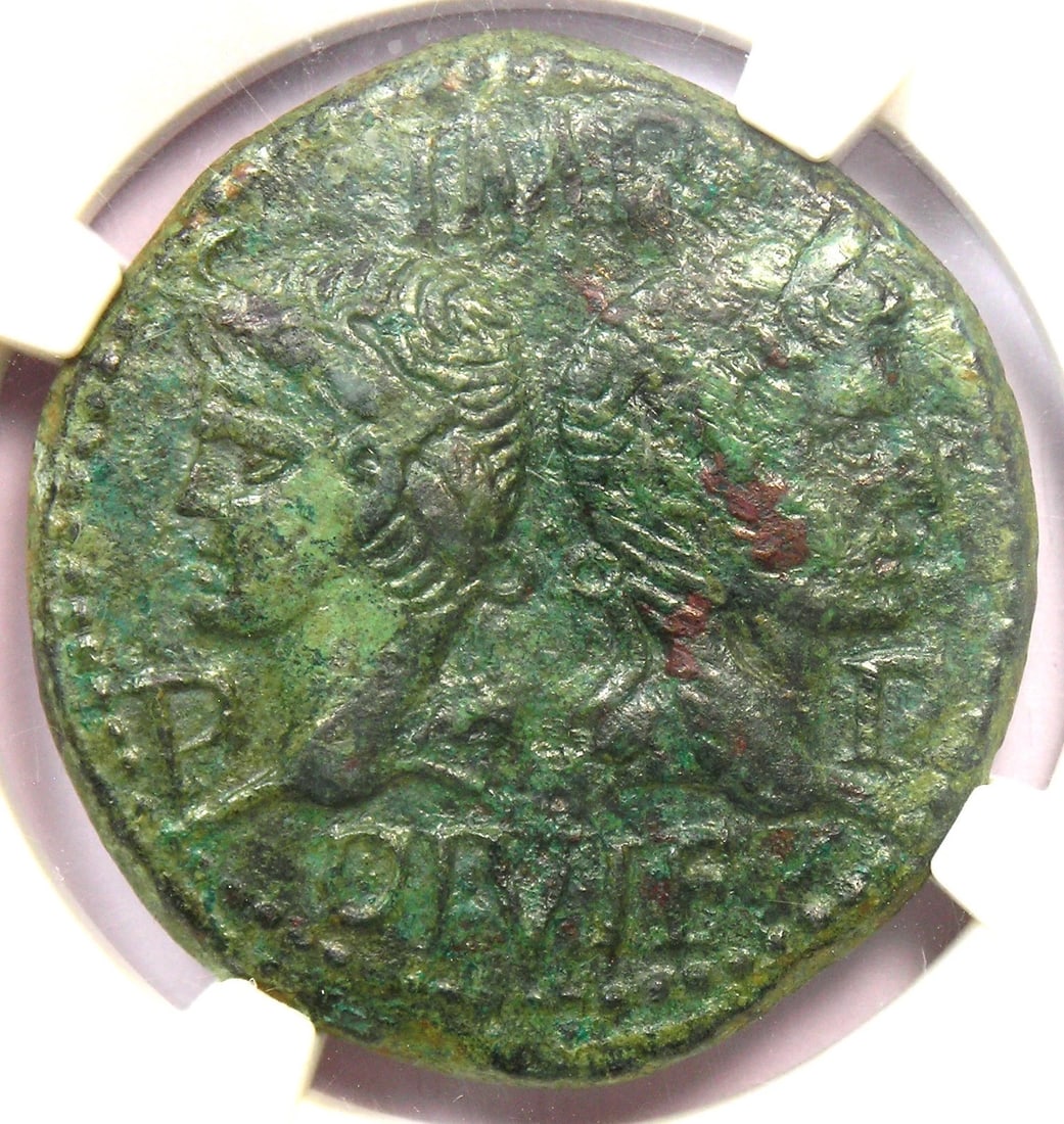 AUGUSTUS AND AGRIPPA AE DUPONDIUS GAUL NEMAUSUS CROCODILE COIN: Augustus and Agrippa AE Dupondius Gaul Nemausus Crocodile Coin Year: 10-14 AD Denomination: Dupondius Country of Origin: Italy Accessories: None Accessories Notice: When purchasing pre-owned goods,