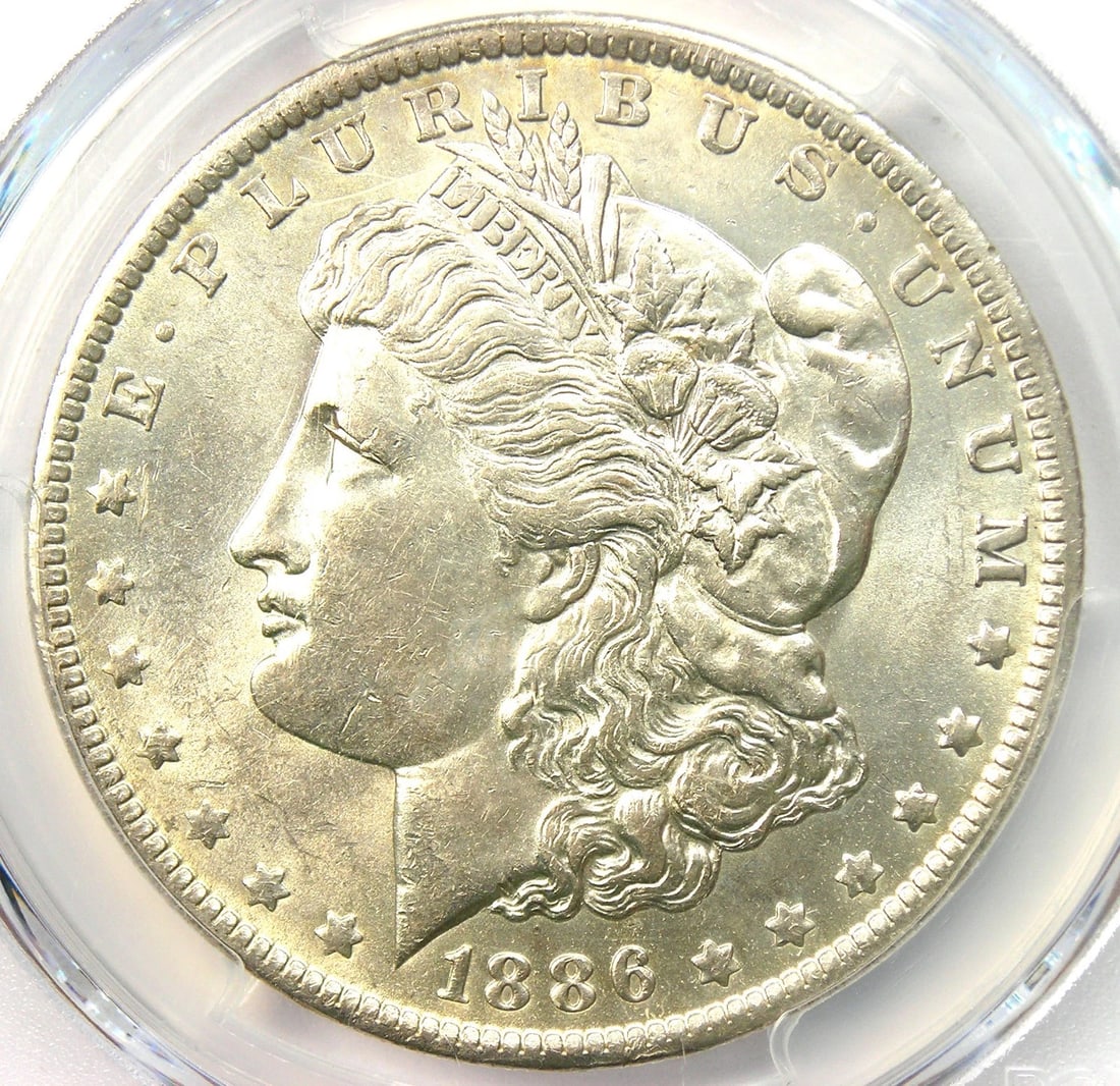 1886-O MORGAN SILVER DOLLAR $1 COIN: 1886-O Morgan Silver Dollar $1 Coin Year : 1886 Denomination : $1 Country of Origin : United States Accessories: None Accessories Notice: When purchasing pre-owned goods, please refer to the photos