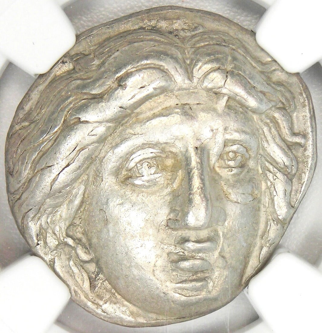 CARIA RHODES AR TETRADRACHM SILVER HELIOS COIN: Caria Rhodes AR Tetradrachm Silver Helios Coin Year: 305 BC Denomination: Tetradrachm Country of Origin: Greece Accessories: None Accessories Notice: When purchasing pre-owned goods, please refer to