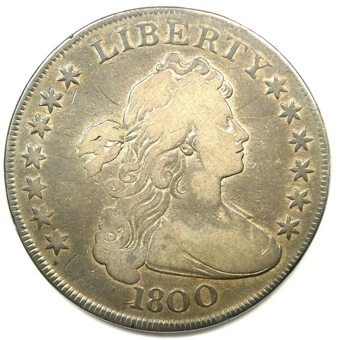 1800 DRAPED BUST SILVER DOLLAR $1 COIN: 1800 Draped Bust Silver Dollar $1 Coin Year : 1800 Denomination : $1 Country of Origin : United States Accessories: None Accessories Notice: When purchasing pre-owned goods, please refer to the photos