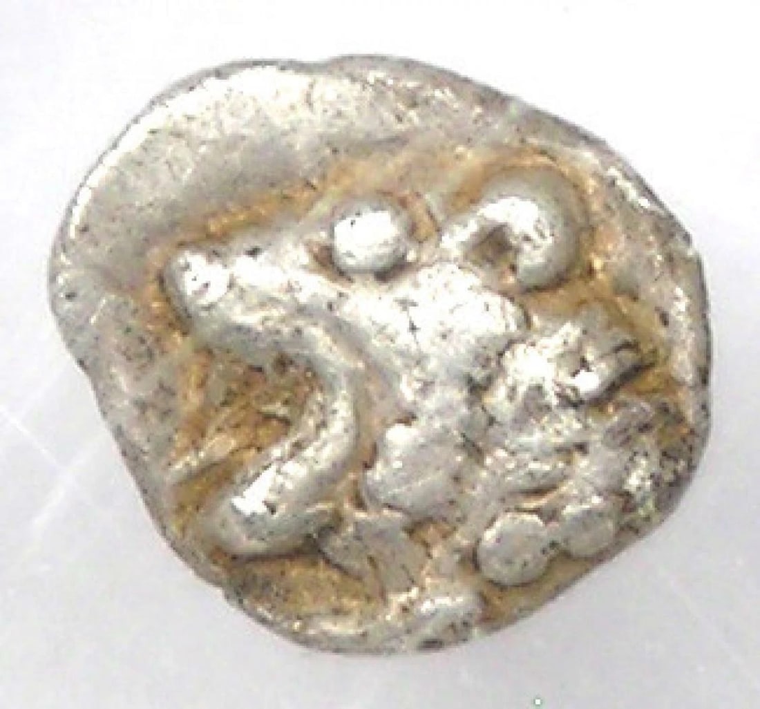 WESTERN ASIA MINOR LION AR TETARTEMORION SILVER COIN: Western Asia Minor Lion AR Tetartemorion Silver Coin Year : 400 BC Denomination : Tetartemorion Country of Origin : Greece Accessories: None Accessories Notice: When purchasing pre-owned goods,