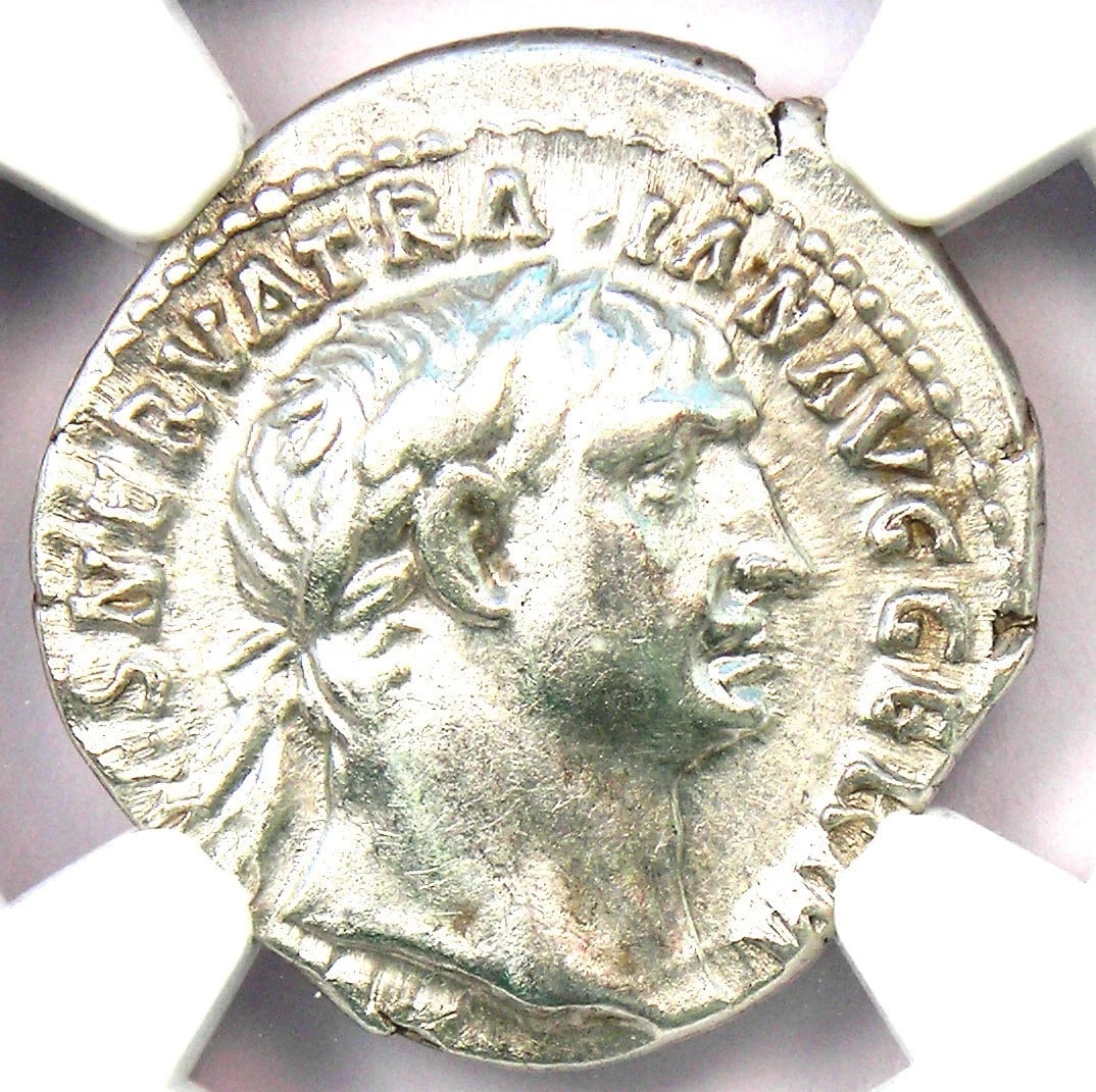 TRAJAN AR DENARIUS SILVER ROMAN COIN: Trajan AR Denarius Silver Roman Coin Year : 117 AD Denomination : Denarius Country of Origin : Italy Accessories: None Accessories Notice: When purchasing pre-owned goods, please refer to the photos o