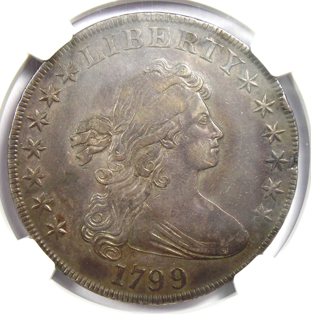1799 DRAPED BUST SILVER DOLLAR $1 COIN: 1799 Draped Bust Silver Dollar $1 Coin Year: 1799 Denomination: $1 Country of Origin: United States Accessories: None Accessories Notice: When purchasing pre-owned goods, please refer to the photos of