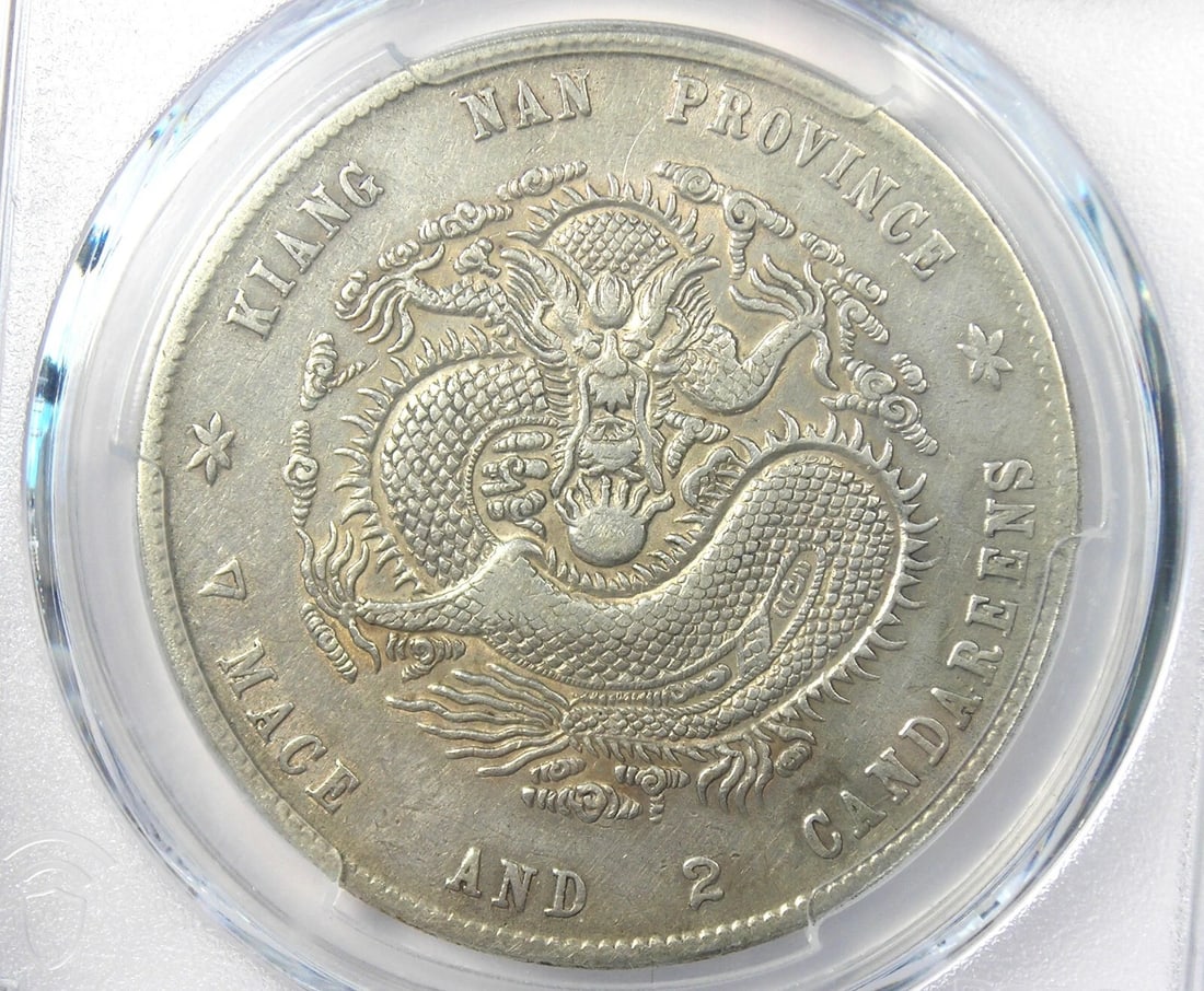1899 CHINA KIANGNAN DRAGON SILVER DOLLAR $1 COIN: 1899 China Kiangnan Dragon Silver Dollar $1 Coin Year: 1899 Denomination: $1 Country of Origin: China Accessories: None Accessories Notice: When purchasing pre-owned goods, please refer to the photos 