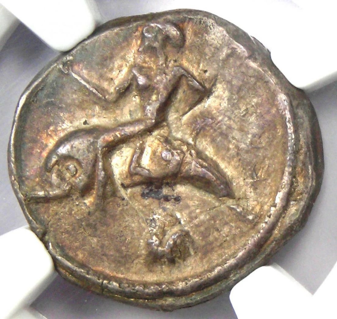 CALABRIA TARAS AR DIDRACHM DOLPHIN COIN: Calabria Taras AR Didrachm Dolphin Coin Year: Denomination: Didrachm Country of Origin: Italy Accessories: None Accessories Notice: When purchasing pre-owned goods, please refer to the photos of the i