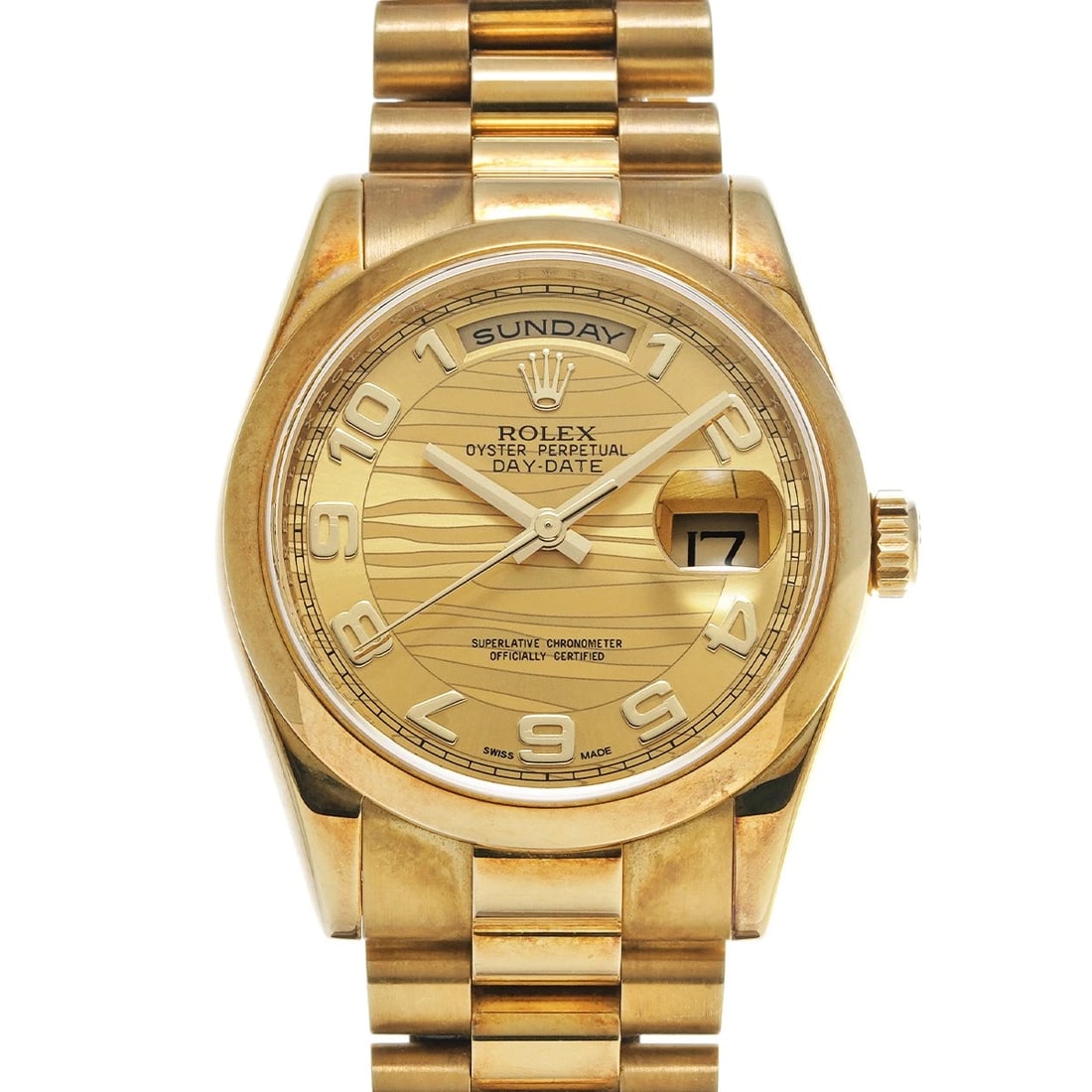 ROLEX DAY-DATE CHAMPAGNE WAVE WATCH: ROLEX Day-Date Champagne Wave Watch Brand: ROLEX Type/Style: Wristwatch Material: Band Material Yellow Gold, Case Material Yellow Gold Color: Dial Color Champagne Wave Size: Case Size H/about 36mm