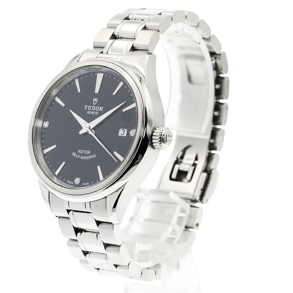 TUDOR STYLE DIAMOND BLACK AUTOMATIC WATCH: TUDOR style diamond black Automatic Watch Brand: TUDOR Type/Style: Wristwatch Material: Band Material Stainless Steel, Case Material Stainless Steel Color: Dial Color black Size: Case size About 38mm