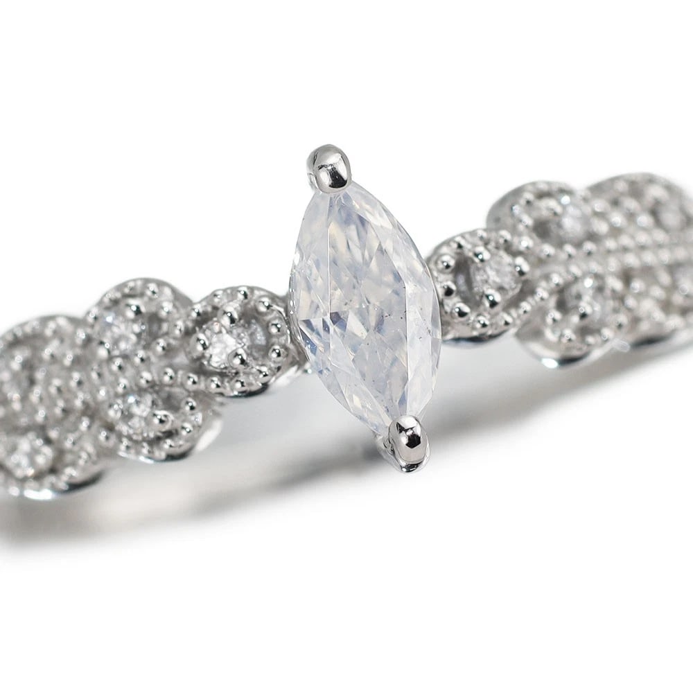 PT950 MARQUISE FANCY WHITE DIAMOND RING: Pt950 Marquise Fancy White Diamond Ring Brand: None Type/Style: Ring Material: Pt950, Main Stone Natural Color: Pt Size: 5.25 US Accessories: None Accessories Notice: When purchasing pre-owned goods,