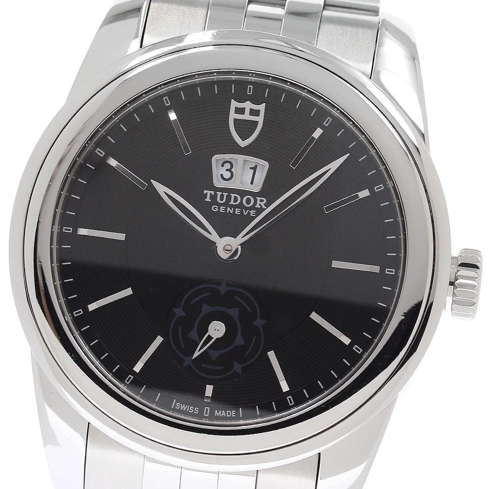 TUDOR GLAMOUR DATE BLACK AUTOMATIC WATCH: TUDOR Glamour date black Automatic Watch Brand: TUDOR Type/Style: Wristwatch Material: Band Material Stainless Steel, Case Material Stainless Steel Color: Dial Color black Size: Case size About 42mm