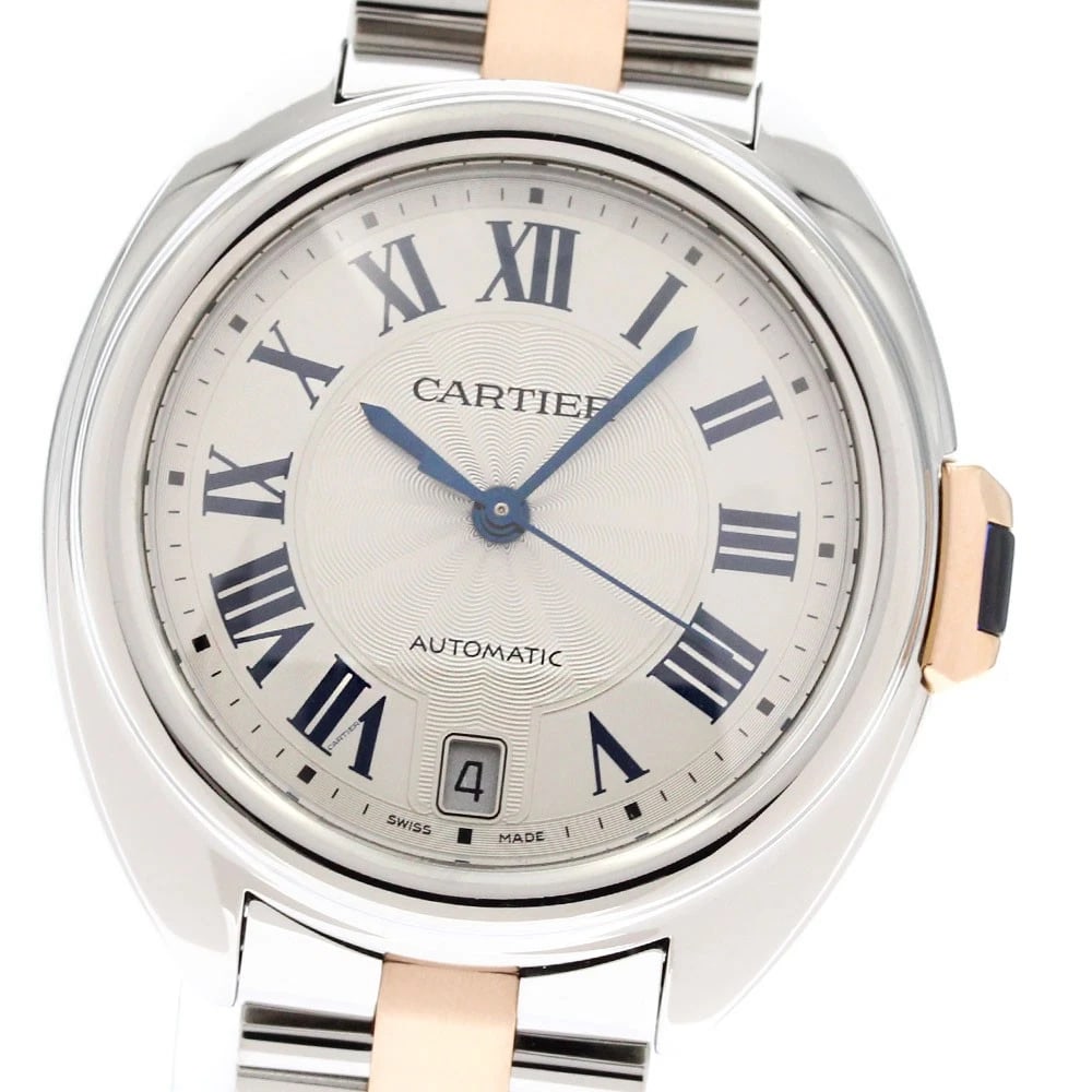 CARTIER KUREDU DATE SILVER AUTOMATIC WATCH: CARTIER Kuredu Date Silver Automatic Watch Brand: CARTIER Type/Style: Wristwatch Material: Band Material Stainless Steel/K18PG, Case Material Stainless Steel Color: Dial Color Silver Size: Case size
