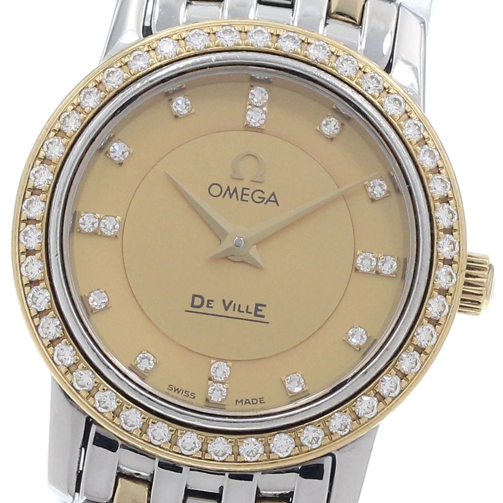OMEGA DE VILLE DIAMOND YG QUARTZ WATCH: OMEGA De Ville Diamond YG Quartz Watch Brand: OMEGA Type/Style: Wristwatch Material: Band Material Stainless Steel/YG, Case Material Stainless Steel/YG Color: Dial Color gold Size: Case size About 22m