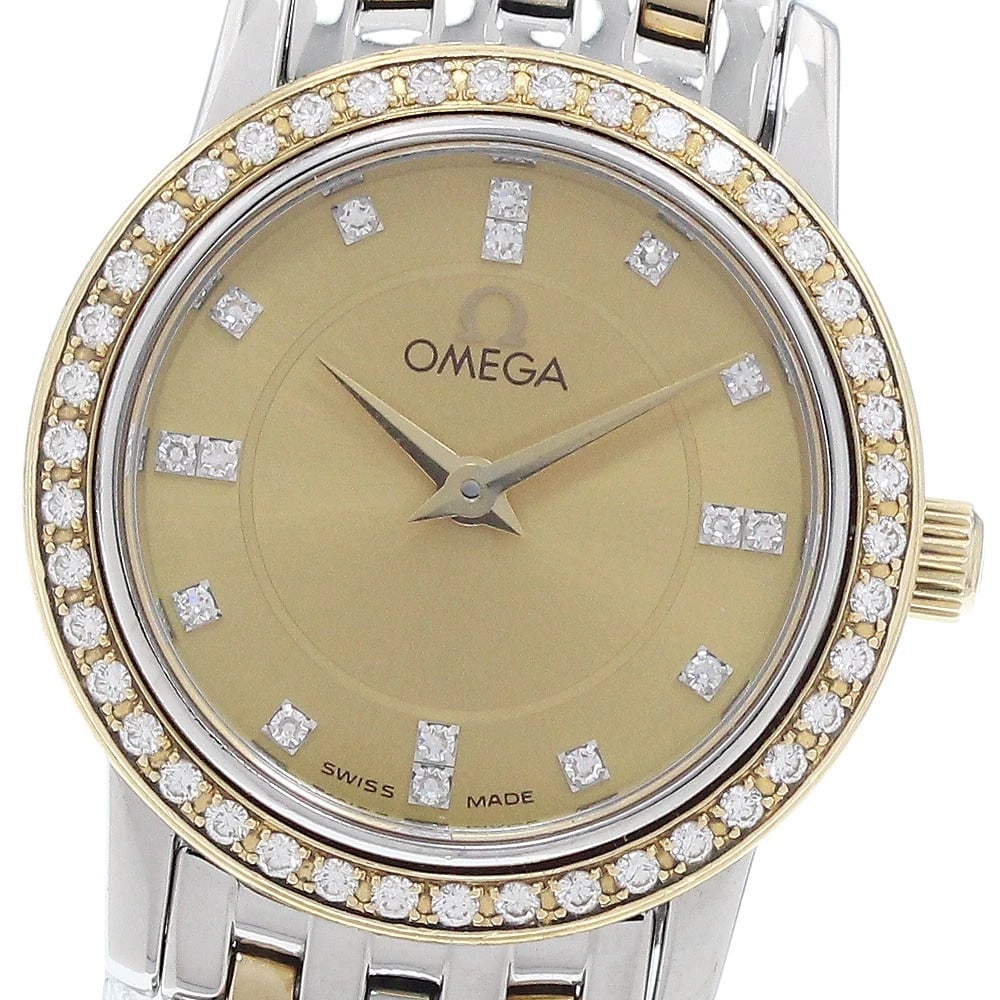 OMEGA DE VILLE DIAMOND TONE GOLD DIAL QUARTZ WATCH: OMEGA De Ville Diamond tone Gold Dial Quartz Watch Brand: OMEGA Type/Style: Wristwatch Material: Band Material Stainless Steel/YG, Case Material Stainless Steel/YG Color: Dial Color gold Size: Case